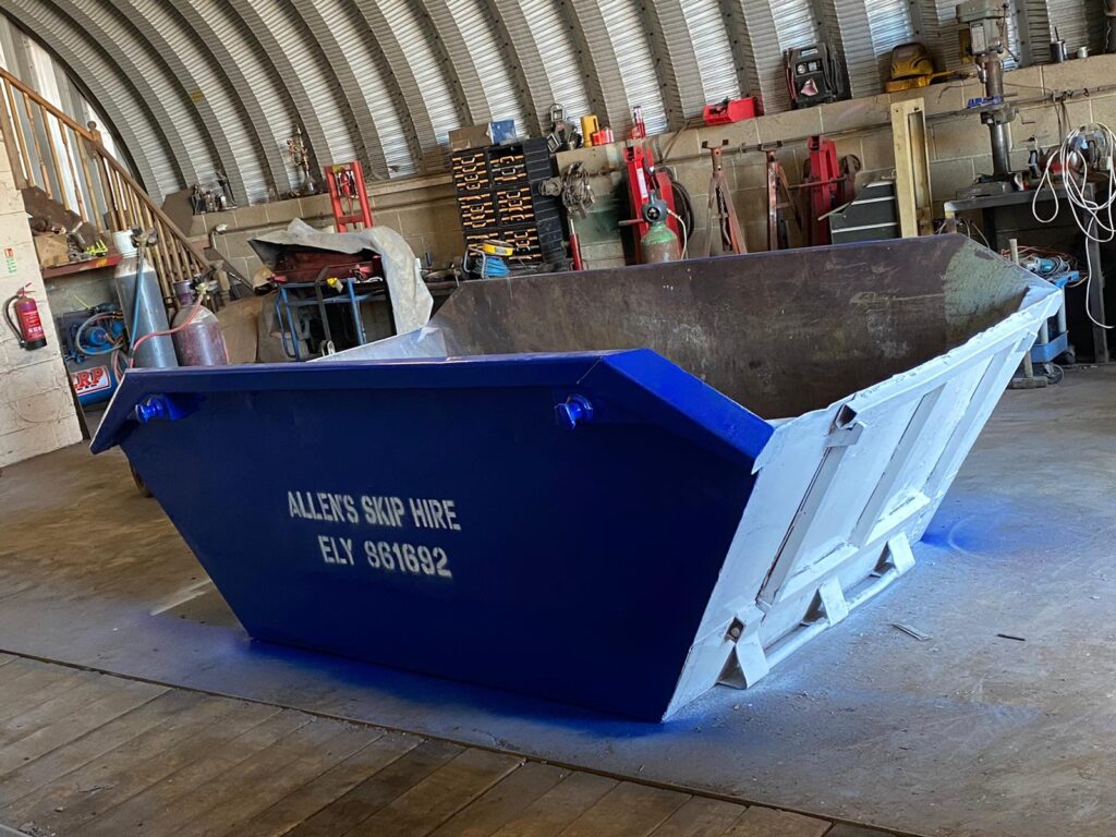 Freshly sprayed Allen's Skip Hire skip at the Littleport depot.